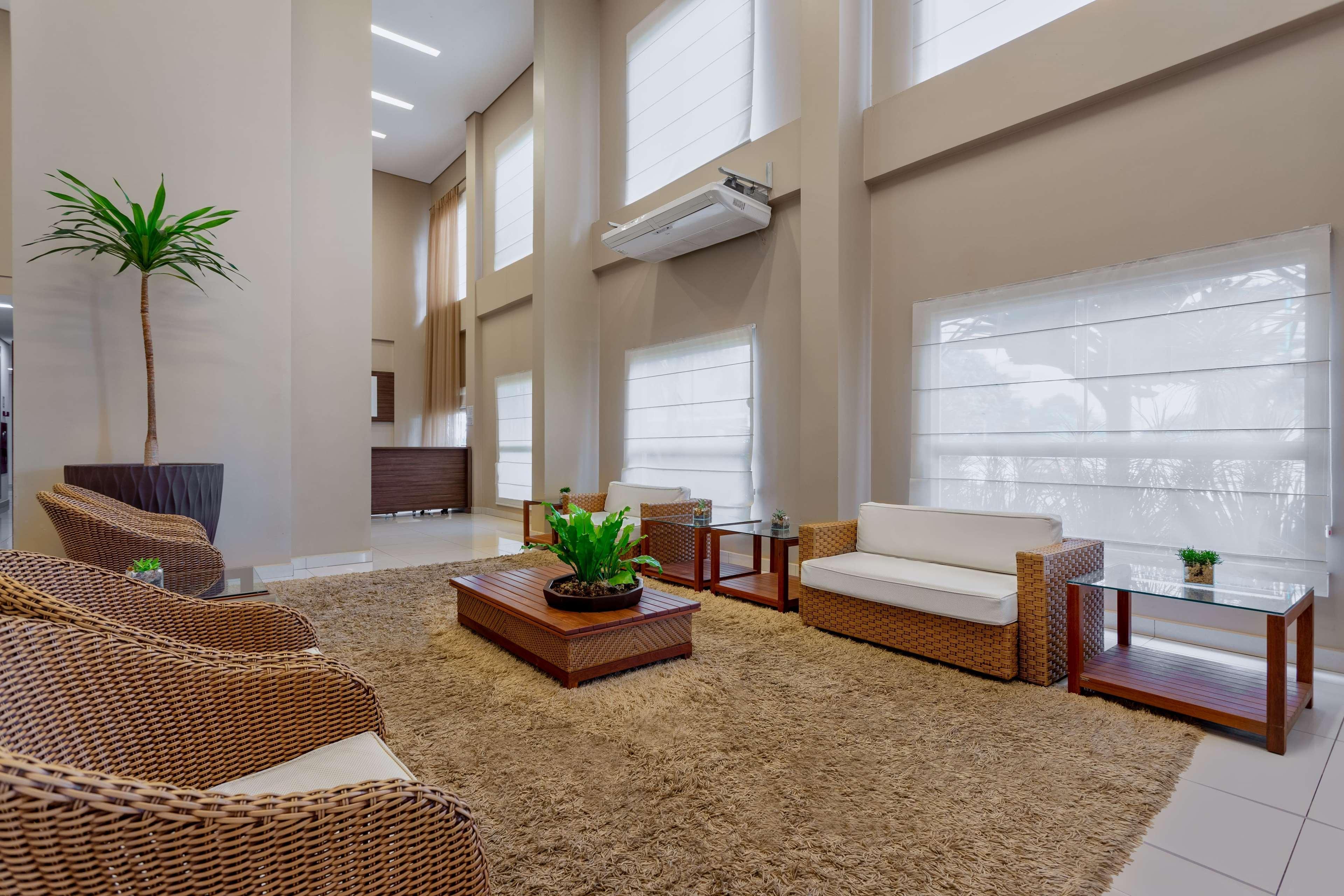 Wyndham Olimpia Royal Hotels 외부 사진 A living room with a carpet